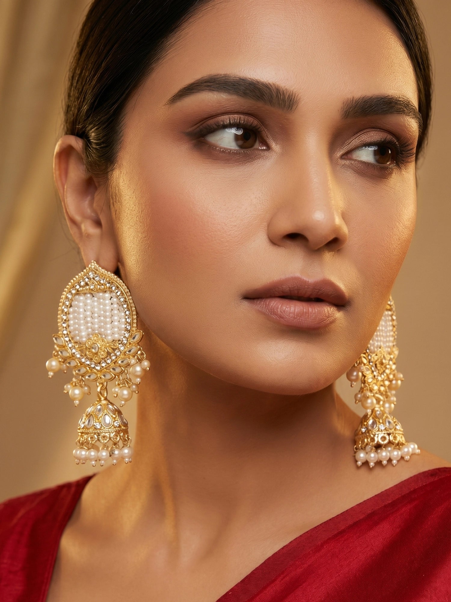 Aadita Gold Plated White Stone Chandelier Jhumka Earrings