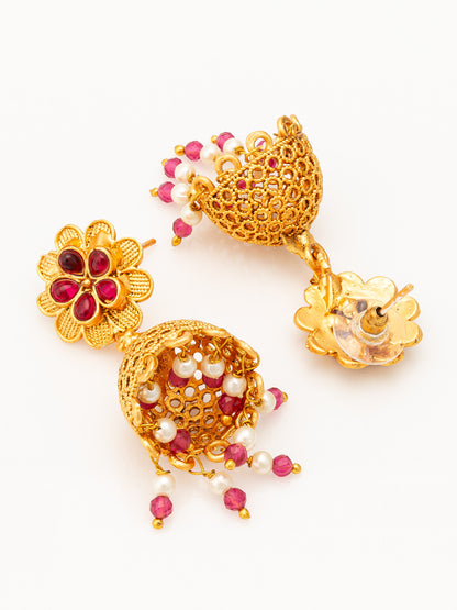 Aadita Gold Plated Floral Jhumka Earrings with Pink Stone Accents