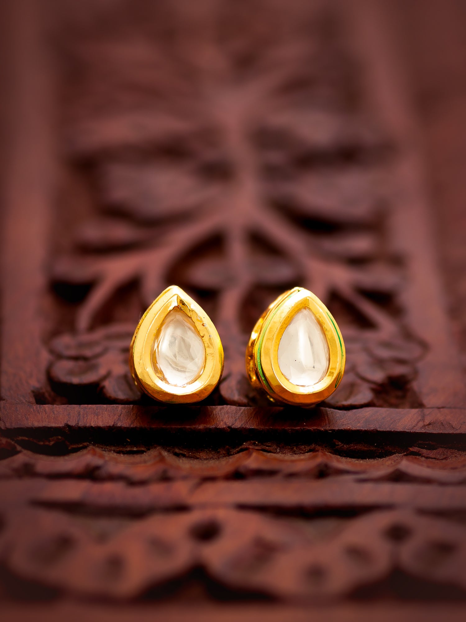 Aadita Gold-Toned Teardrop Kundan Stud Earrings