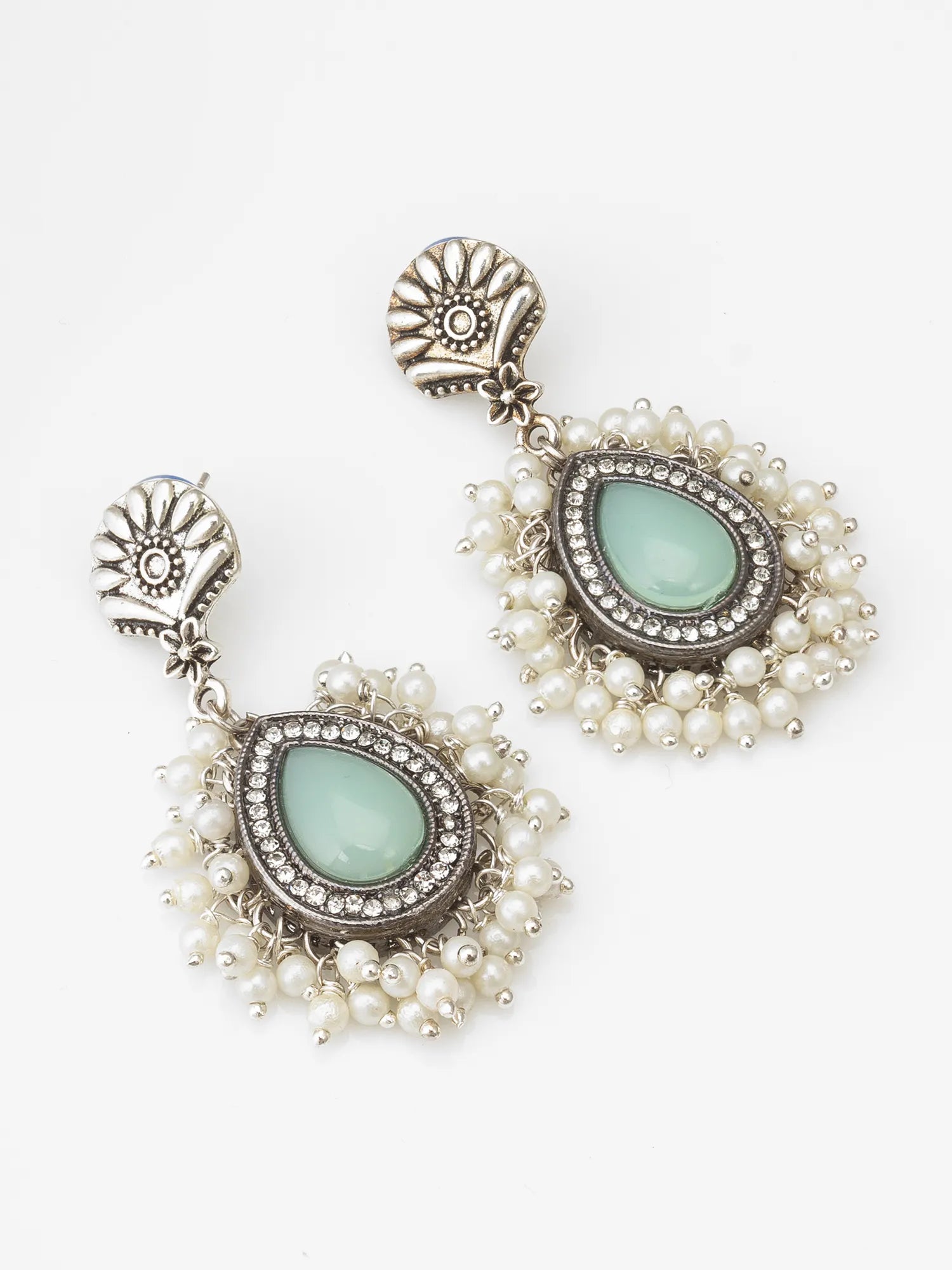 Oxidized Silver Earrings On A White Background