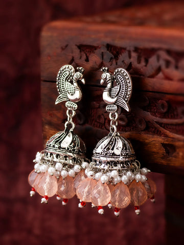 Oxidized Silver Jhumka Earrings On A Background