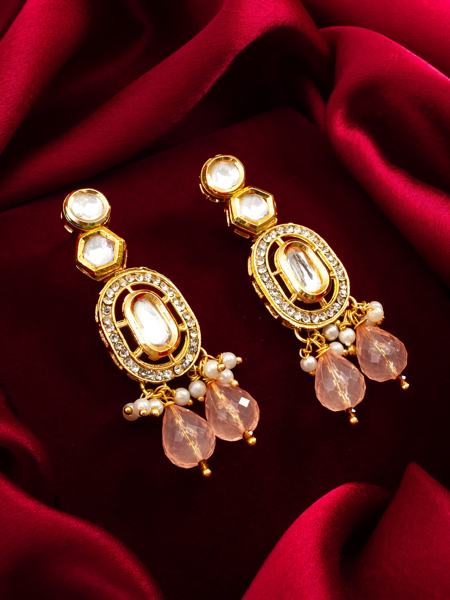 Aadita Gold Kundan Oval Drop Earrings with AD Crystal Border and Peach Bead Cluster