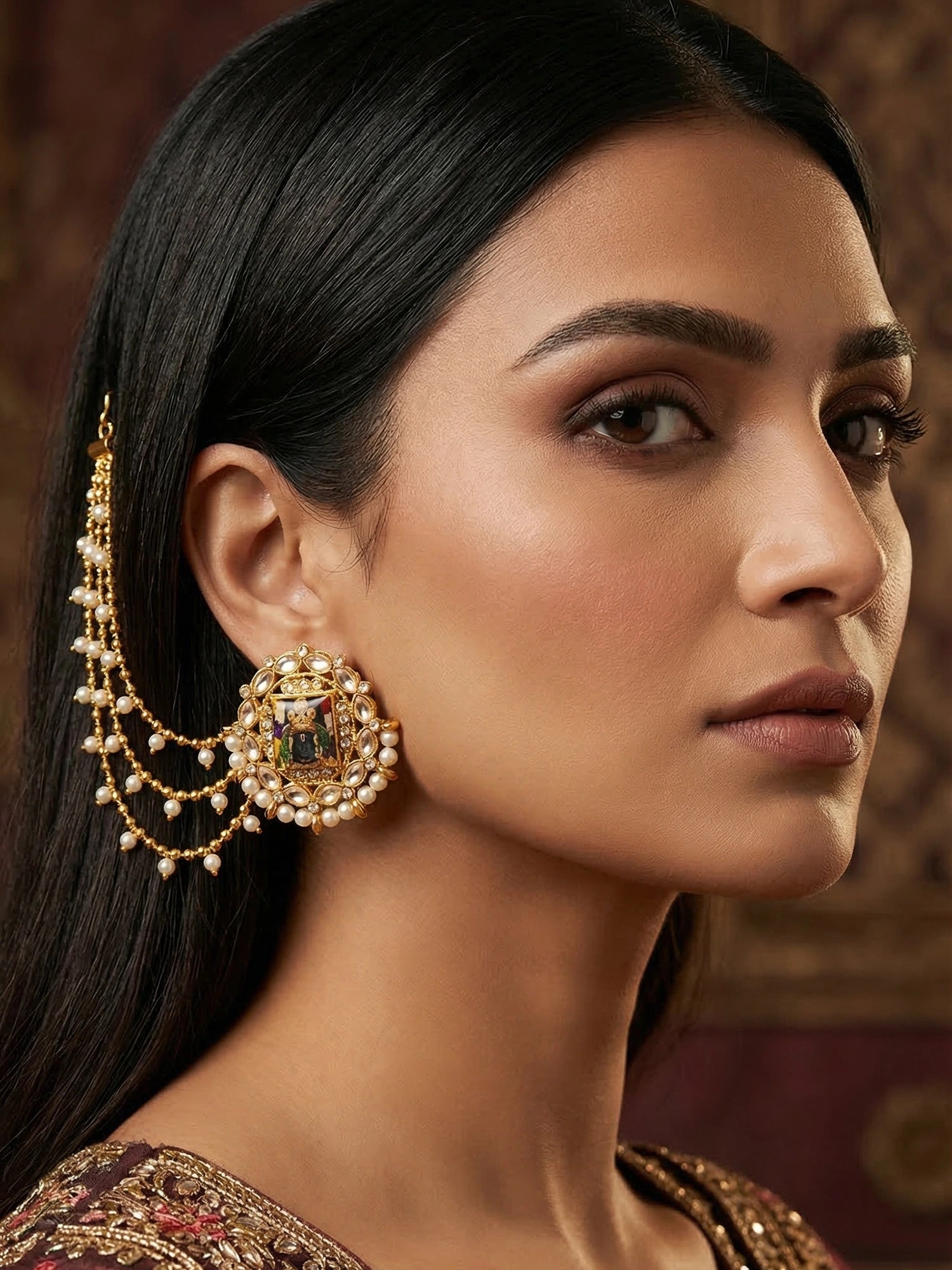 Aadita Bahubali Style Divine Motif Kundan Earrings with Multi-Layer Pearl Chain and AD Stones