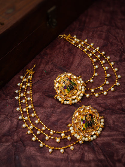 Aadita Bahubali Style Divine Motif Kundan Earrings with Multi-Layer Pearl Chain and AD Stones