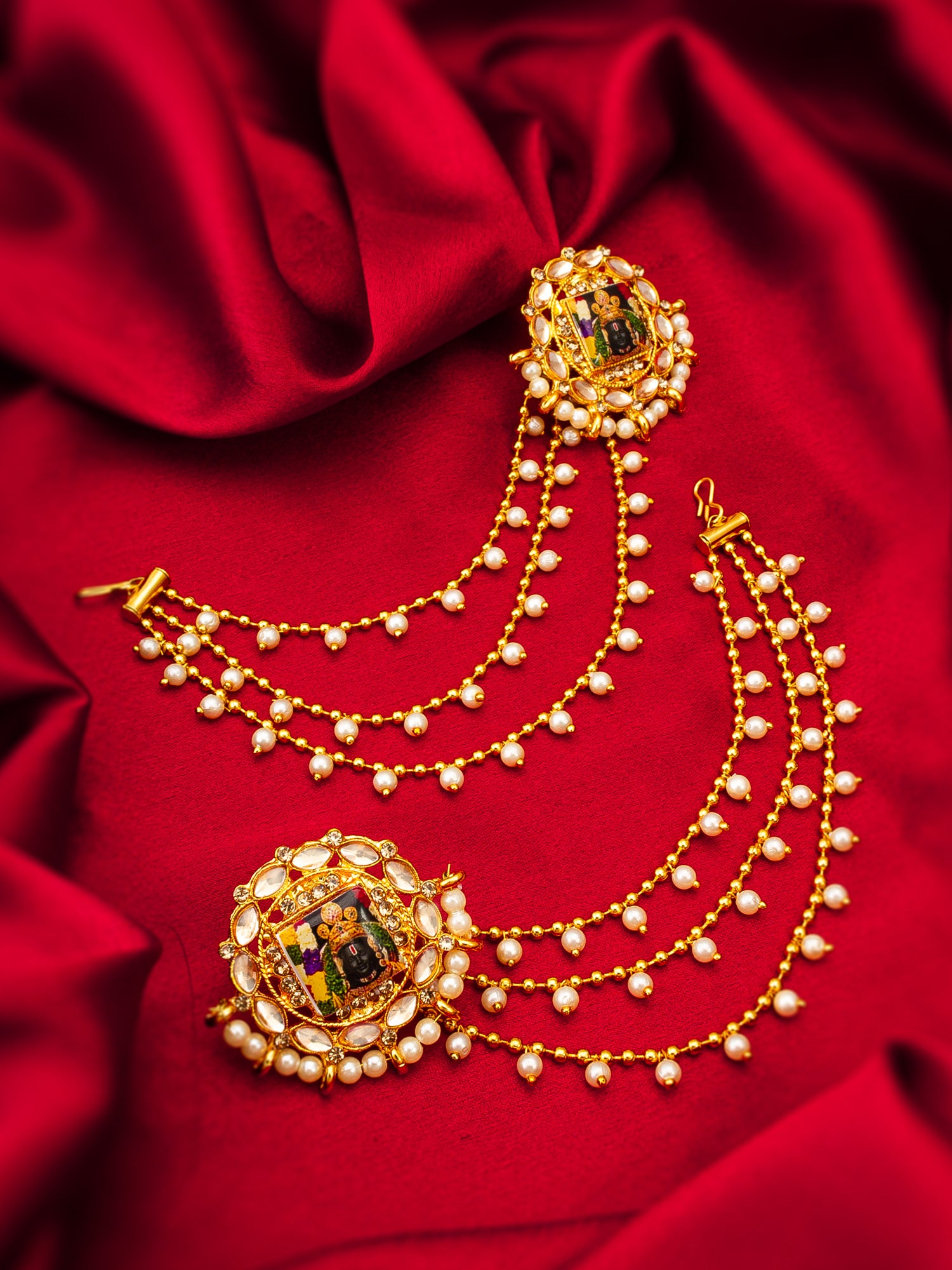 Aadita Bahubali Style Divine Motif Kundan Earrings with Multi-Layer Pearl Chain and AD Stones
