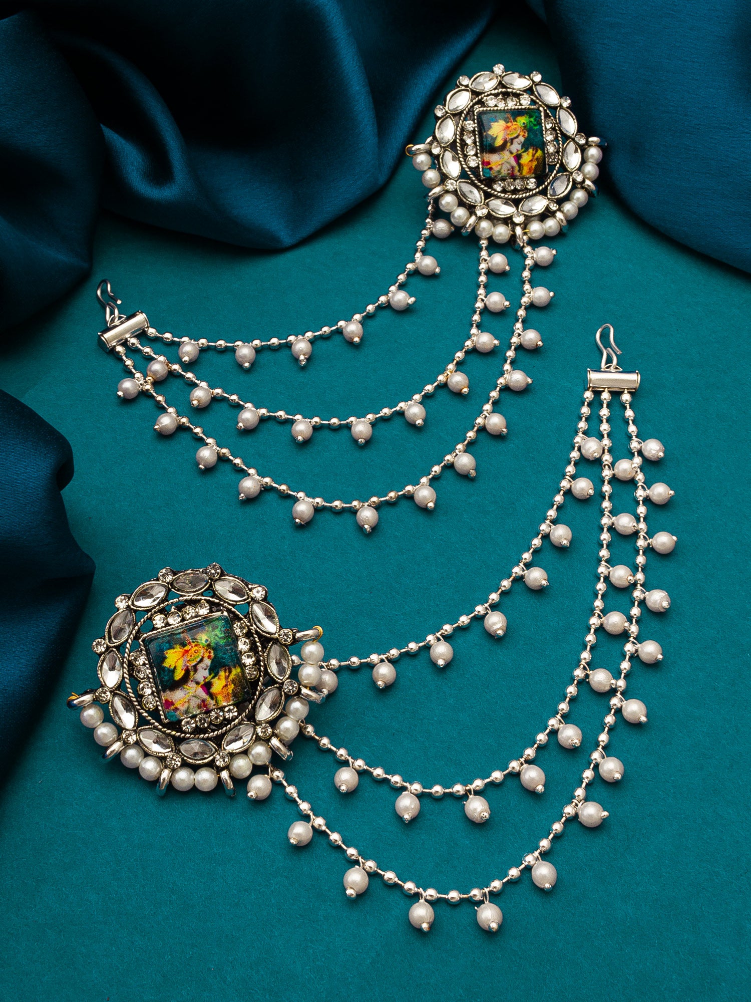Aadita Silver Oxidized Bahubali Earrings with Divine Motif Centre and Multi-Layer Pearl Chain