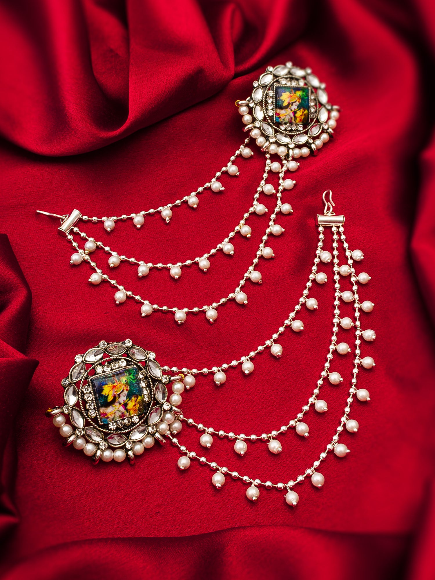 Aadita Silver Oxidized Bahubali Earrings with Divine Motif Centre and Multi-Layer Pearl Chain