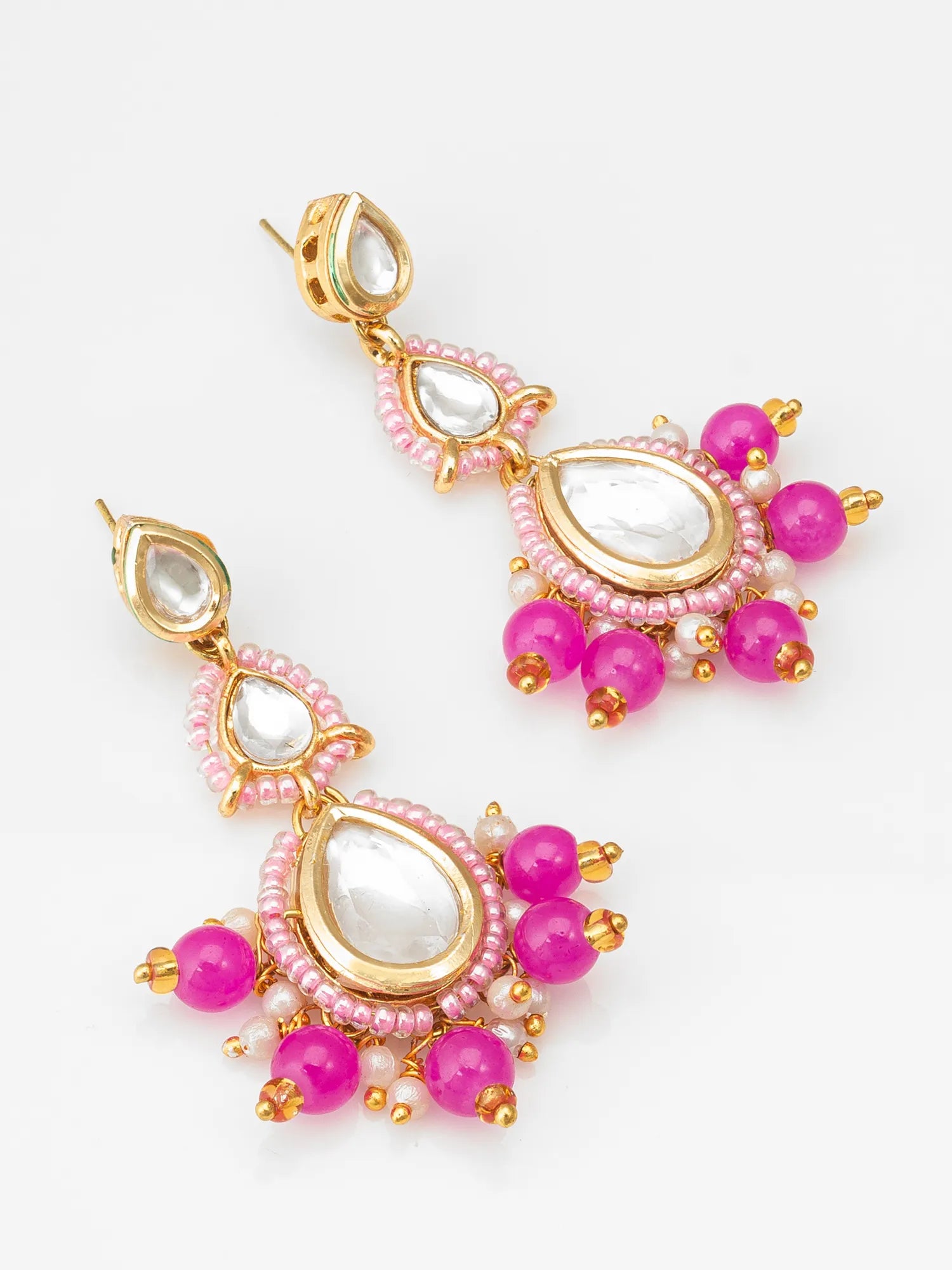 Pink Kundan Beaded Drop Earrings On A White Background