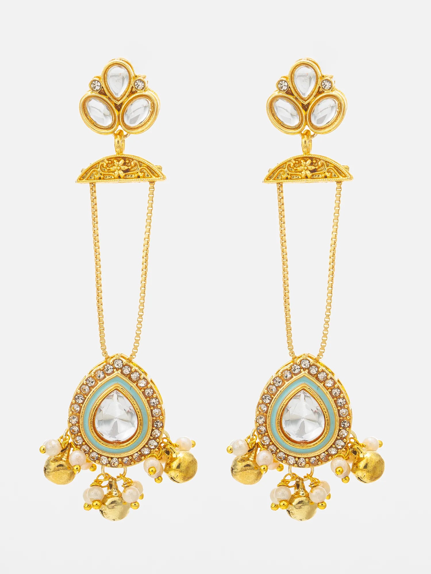 A pair of gold-toned traditional Indian dangle earrings with clear crystals, light blue enamel, and small gold bells, shown against a light gray background.