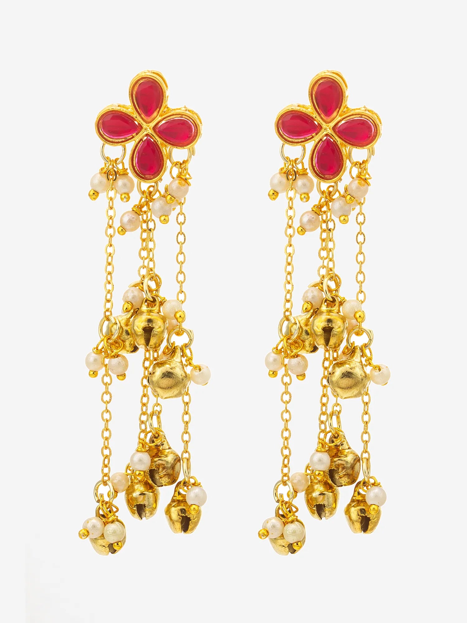 A pair of gold-toned traditional Indian jhumka earrings with a four-petal flower design in pink and gold, adorned with dangling gold chains, small gold bells, and white pearl beads, set against a plain white background.