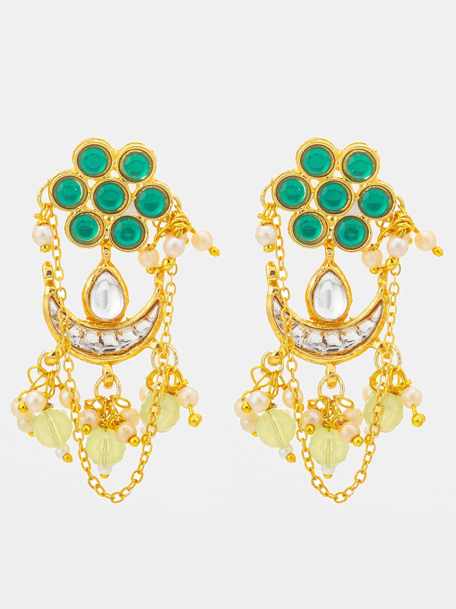A pair of gold-plated Indian Kundan earrings featuring green stone clusters, a crescent moon with a clear teardrop stone, and dangling pearl and light green bead accents, set against a light gray background.
