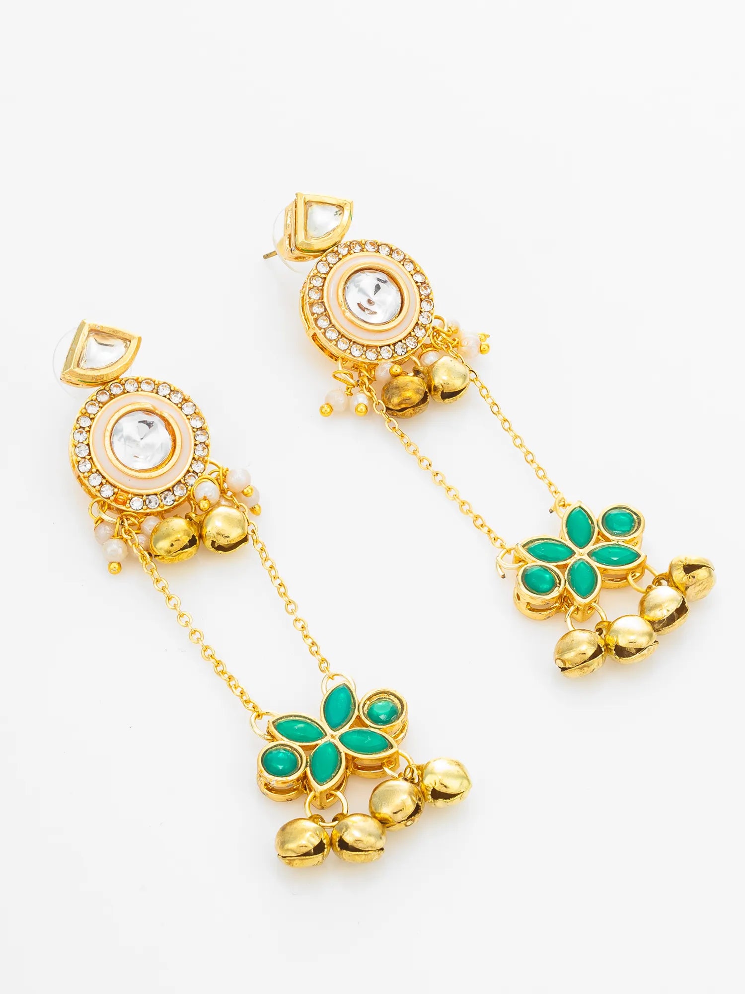 A pair of gold-plated dangle earrings with green enamel floral charms, clear stone accents, and small gold bells, displayed on a clean white background.