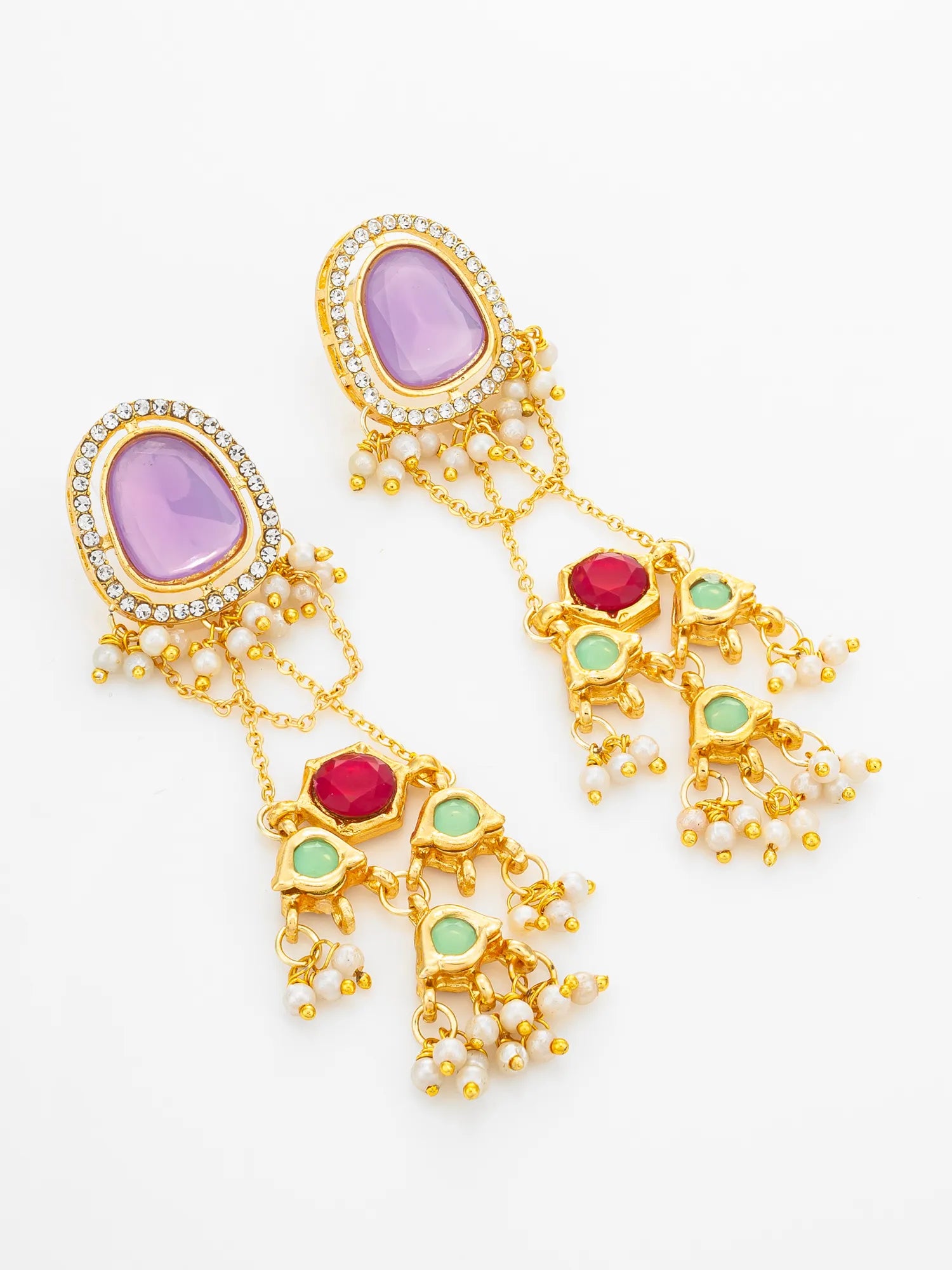 A pair of gold-toned dangle earrings with oval lavender purple stones, small clear stones, and cascading chains with red and light green stones and white pearl-like beads, shown on a plain white background.