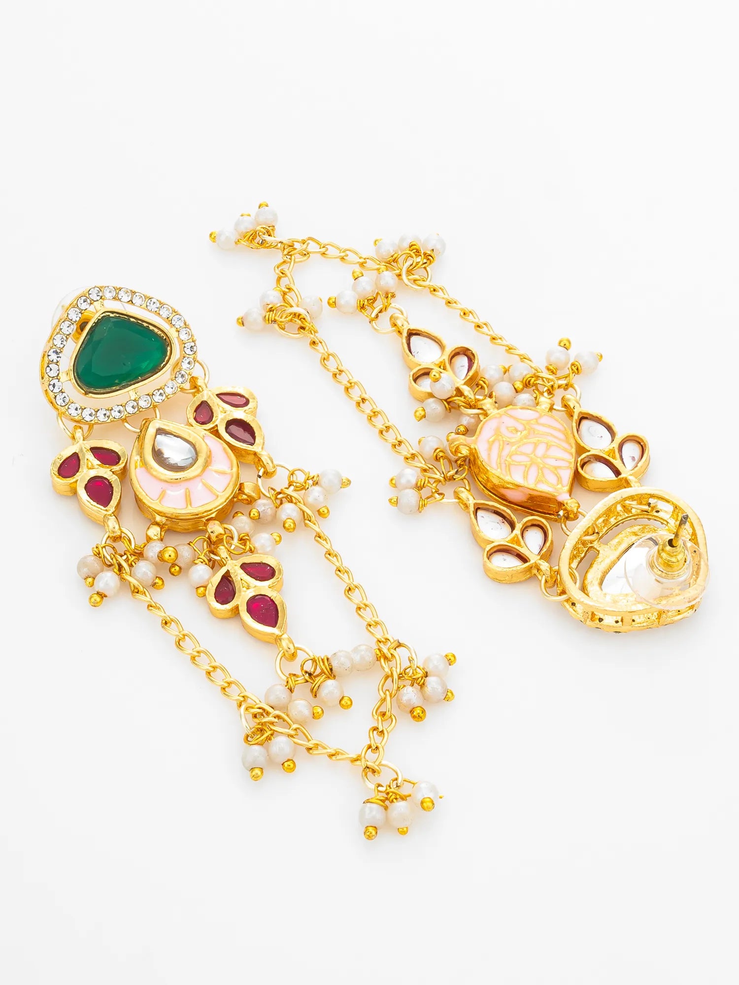 Gold-toned traditional Indian jewelry set featuring a large teardrop-shaped green stone pendant, a pink and white floral charm, red accent stones, and white pearl-like beads on delicate chains, displayed on a clean white background.