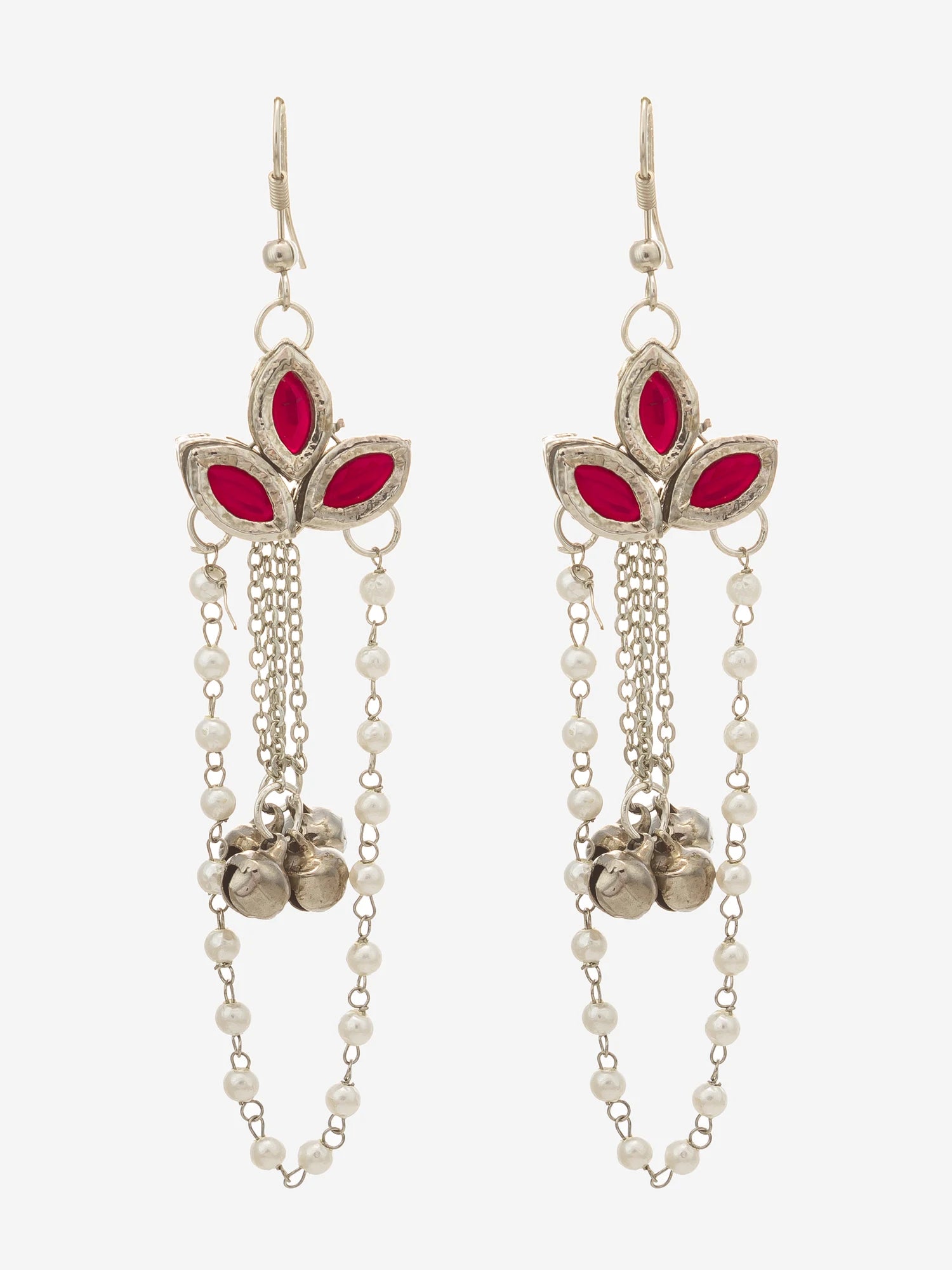 A pair of silver-toned dangle earrings with bright pink enamel petal details, white pearl bead chains, and small silver bell charms, shown against a light gray background.