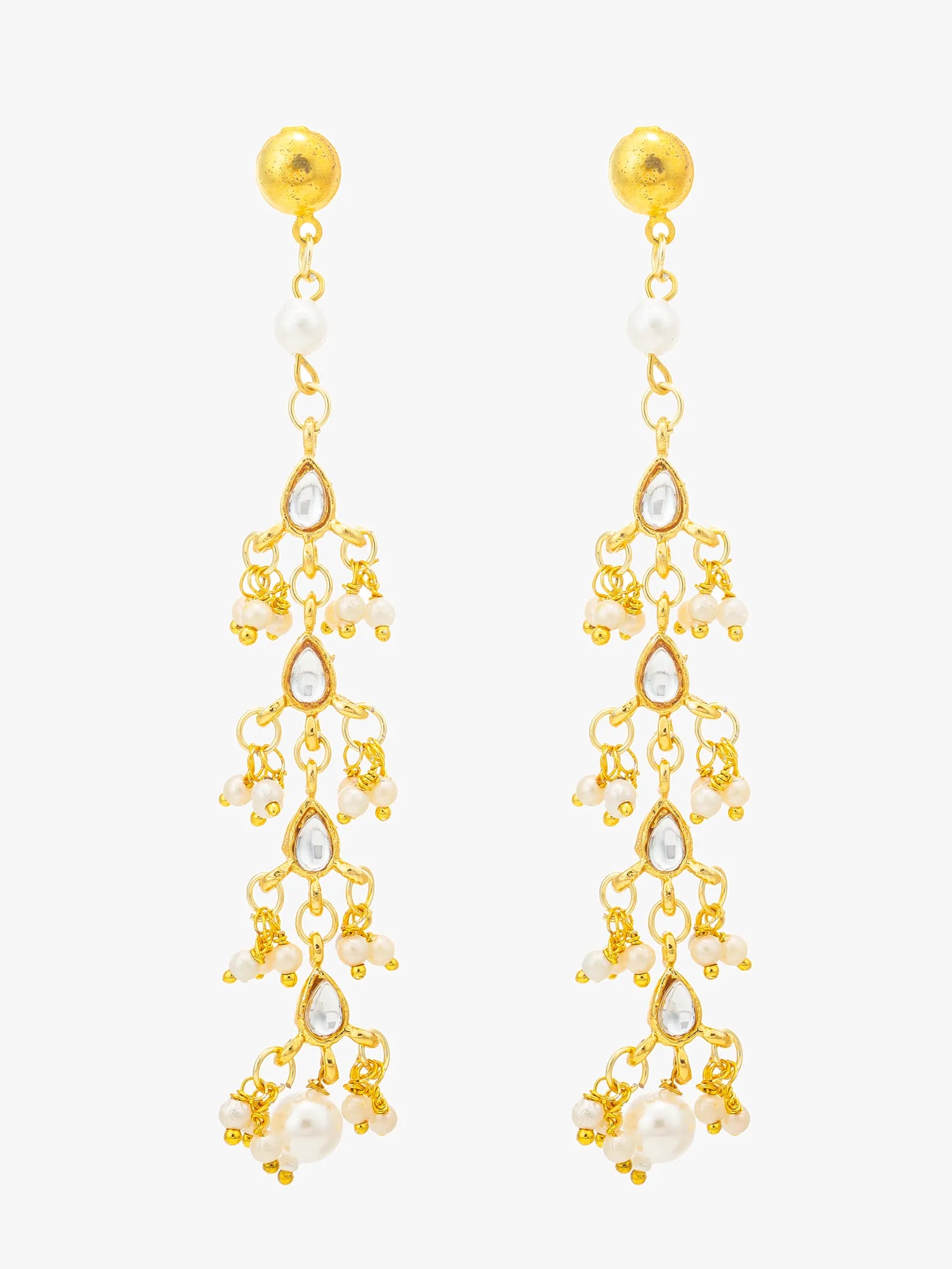 A pair of gold dangle earrings with white pearl-like beads and clear teardrop rhinestones, shown against a plain white background.