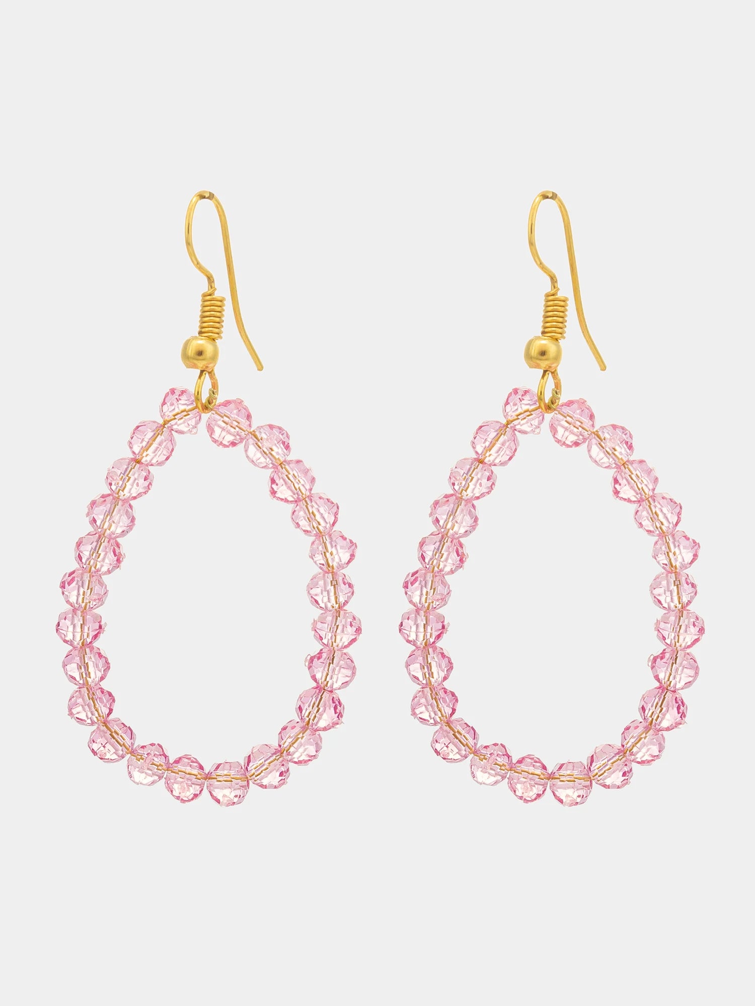 A pair of gold-tone drop earrings with teardrop-shaped borders made of small, faceted pink beads, shown against a light gray background.