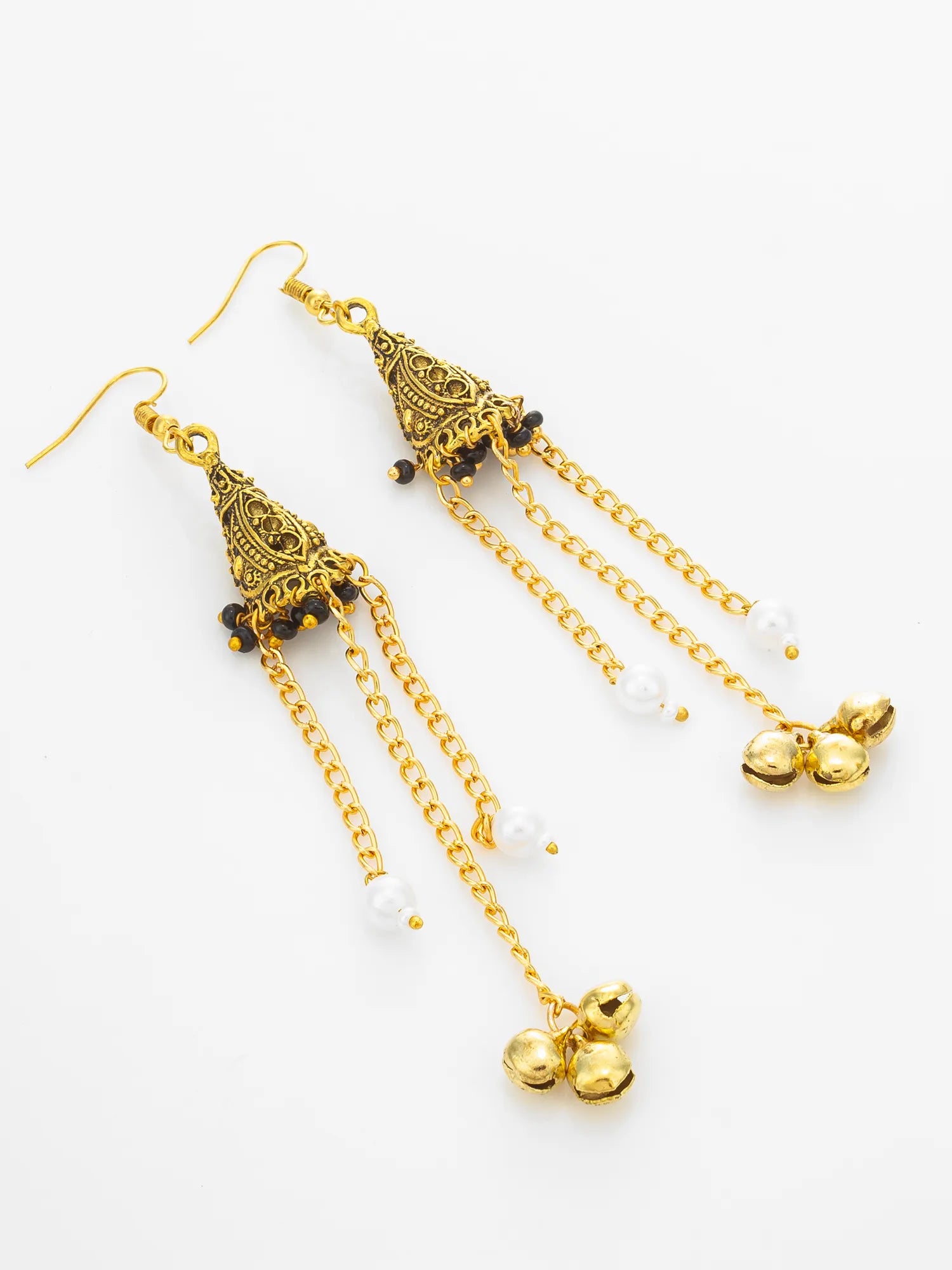 A pair of gold-toned dangle earrings with ornate filigree details, hanging chains, small white pearl-like beads, and three gold bell charms at the end, displayed on a clean white background.