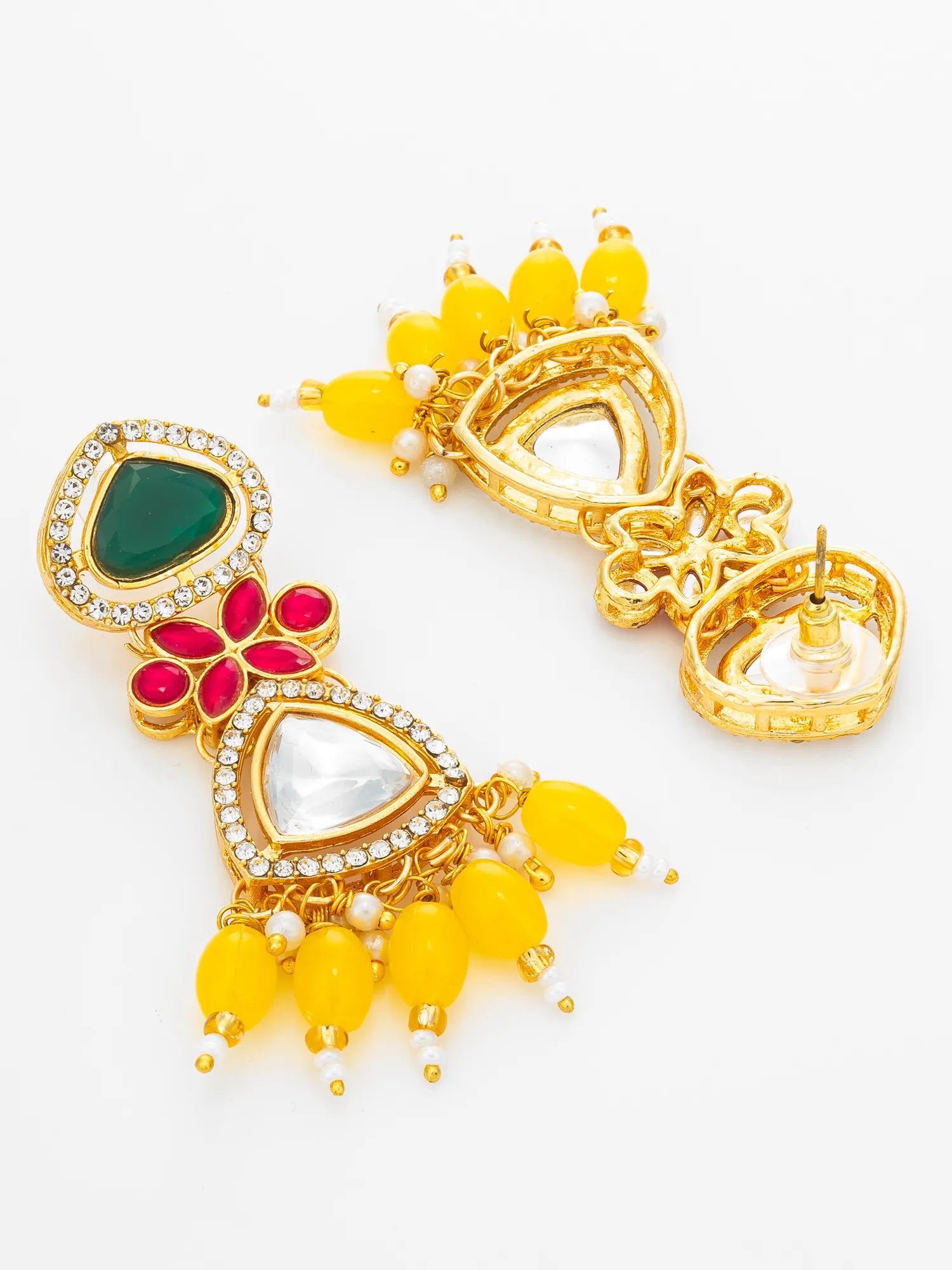 A pair of gold-toned statement earrings with yellow bead drops, a green teardrop stone, white marquise stones, and red floral accents, displayed on a white background.