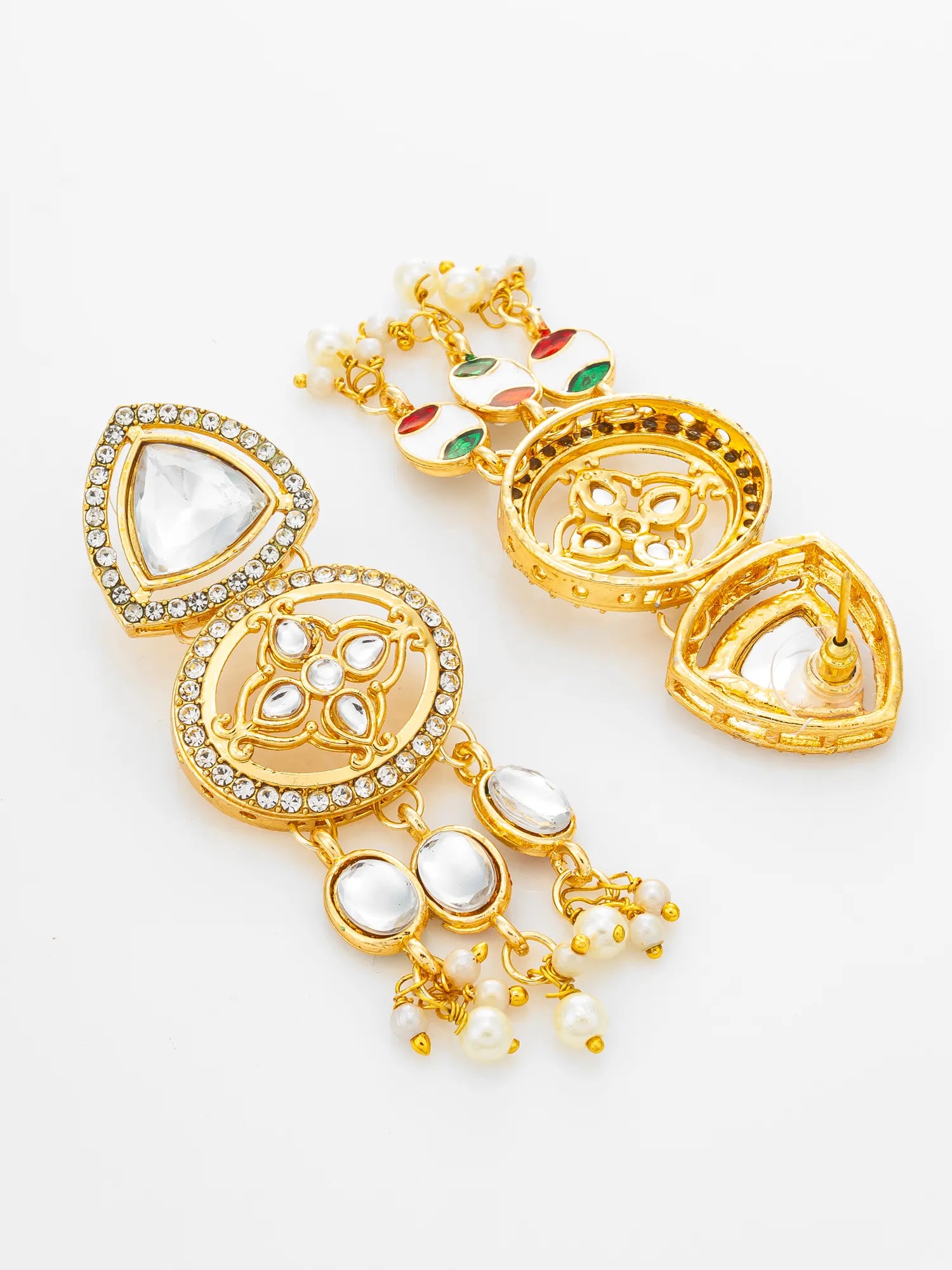 A pair of gold-toned statement earrings with clear stones, white faux pearls, and small red and green enamel accents, displayed on a clean white background.