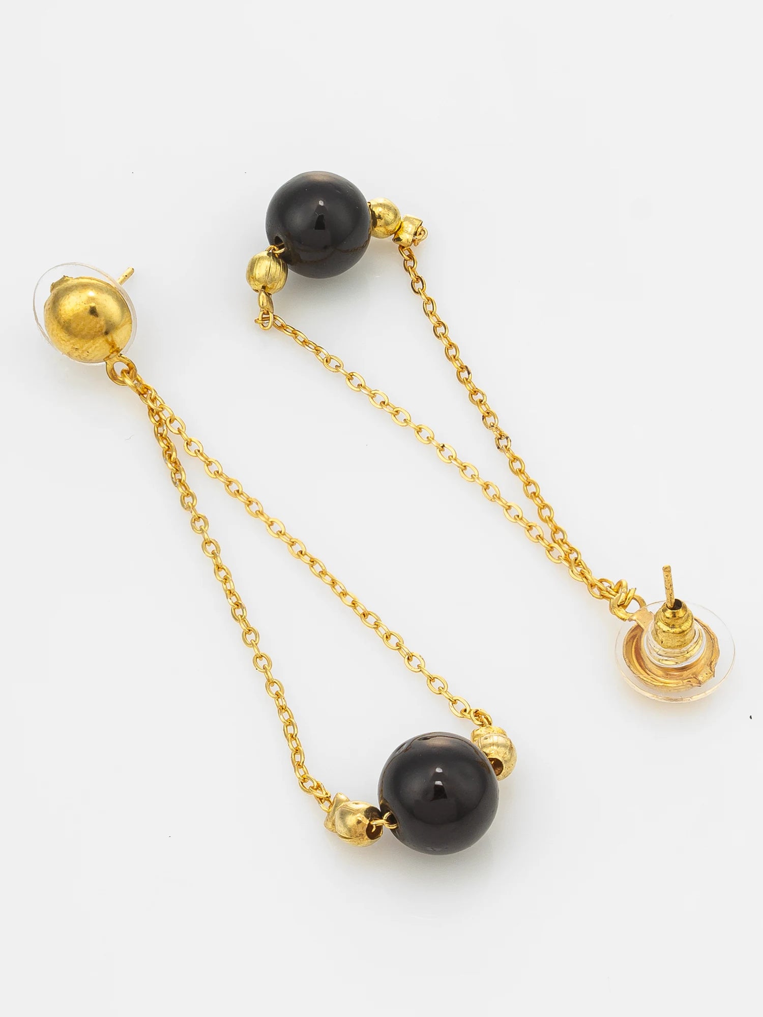A pair of gold chain dangle earrings with black spherical beads and clear crystal accents, displayed on a clean white background.