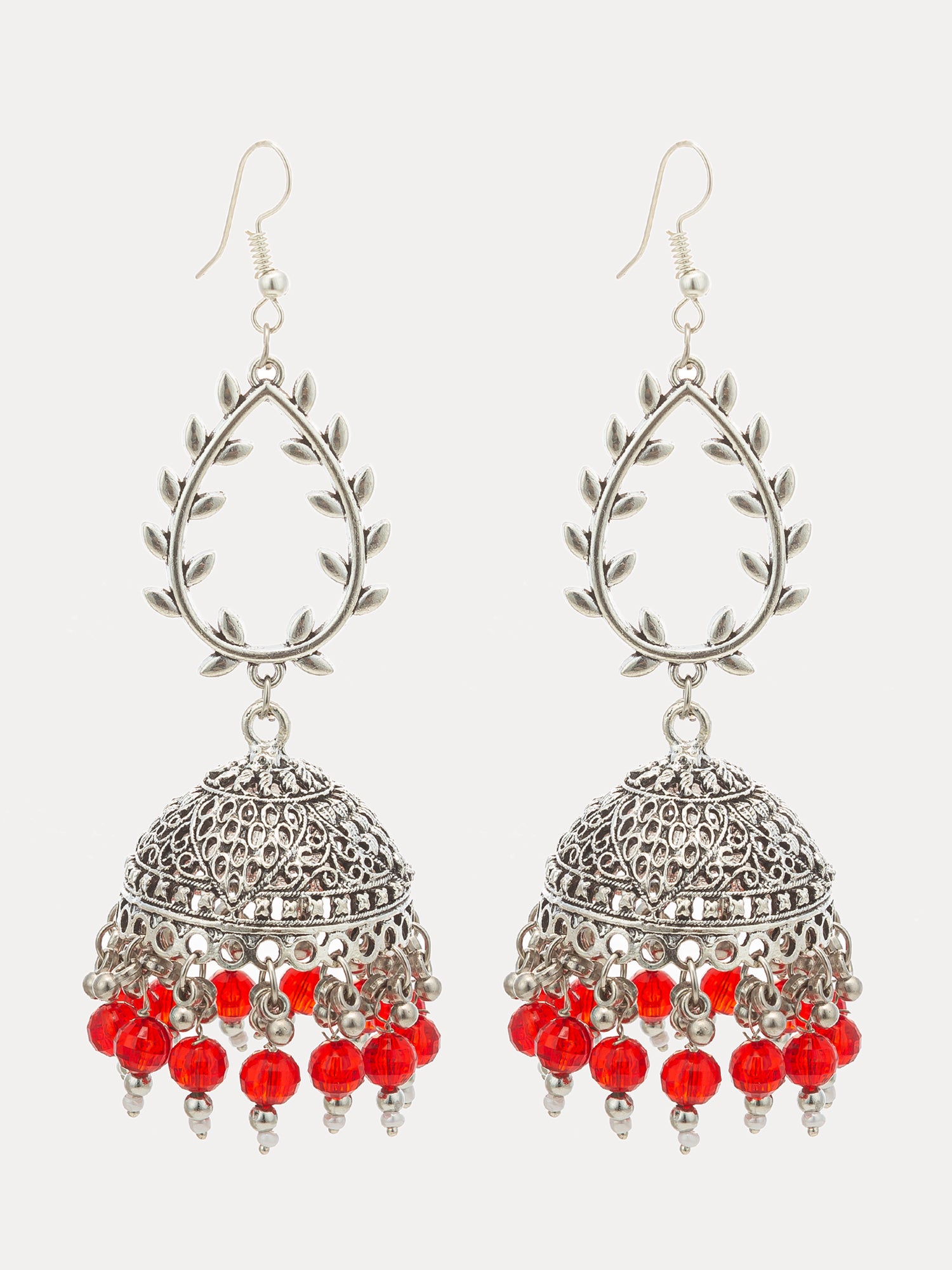 A pair of silver-toned filigree dangle earrings with red bead fringe, shown on a light gray background.
