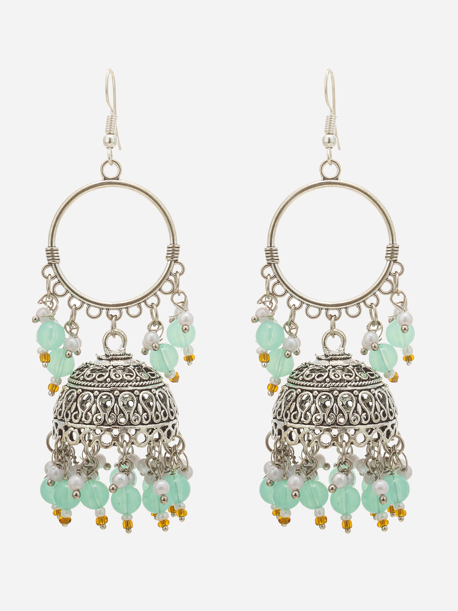A pair of bohemian-style dangle earrings featuring silver-toned filigree bell charms, mint green faceted beads, and small white pearl-like accents, shown against a light gray background.