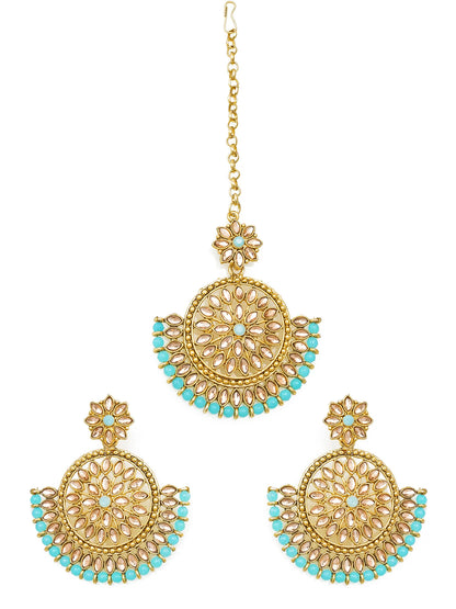 Gold and turquoise earrings on a white background