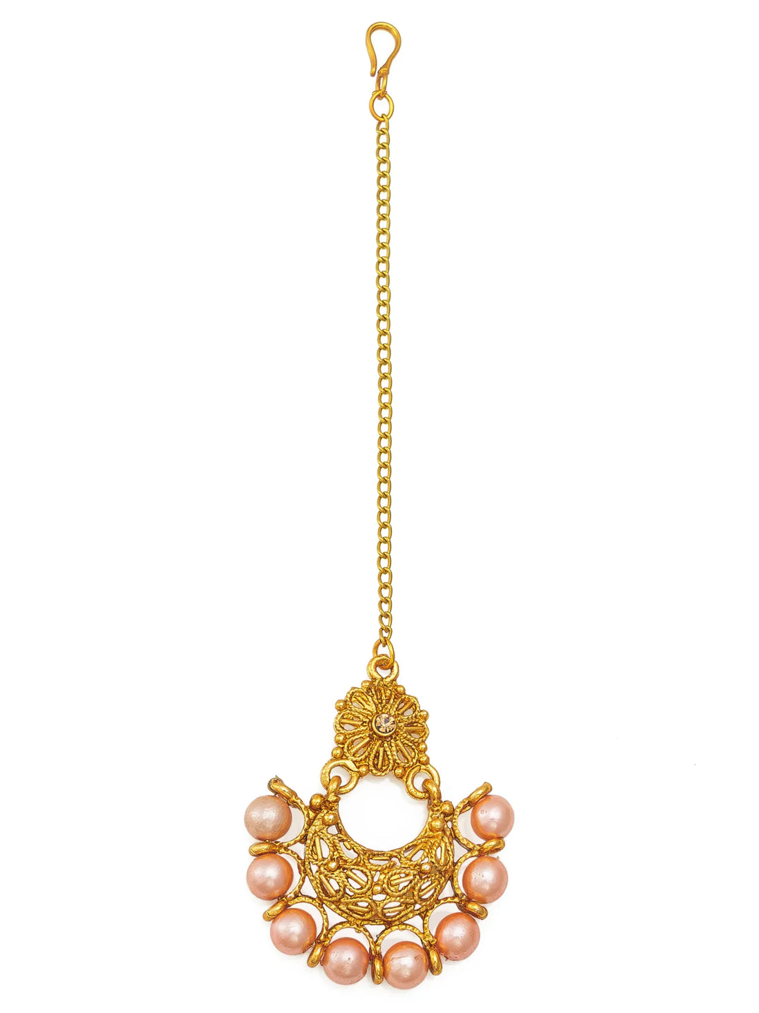 Gold necklace with pink pearls on a red fabric background