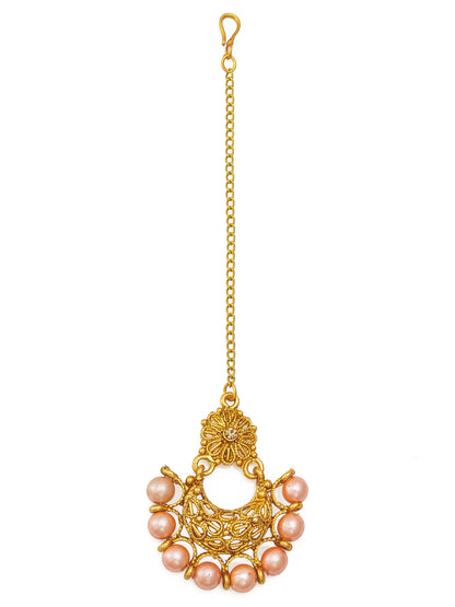 Gold and pink decorative keychain on a white background