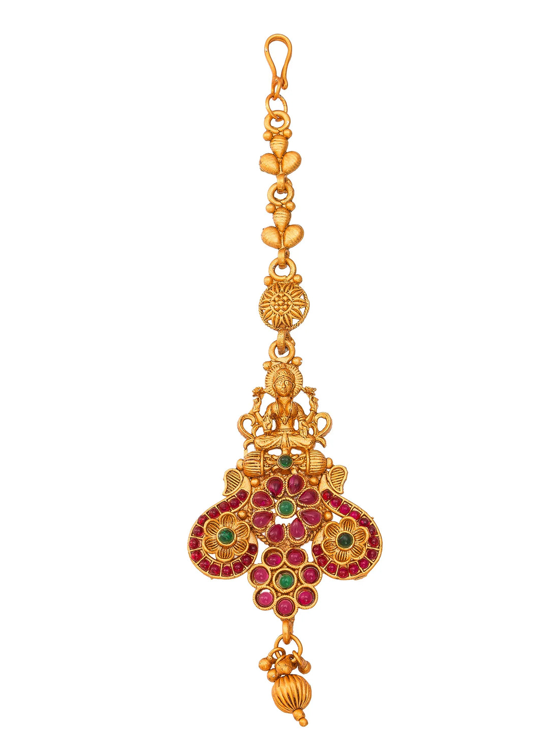 Gold decorative item with green gemstones on a red fabric background with flowers.