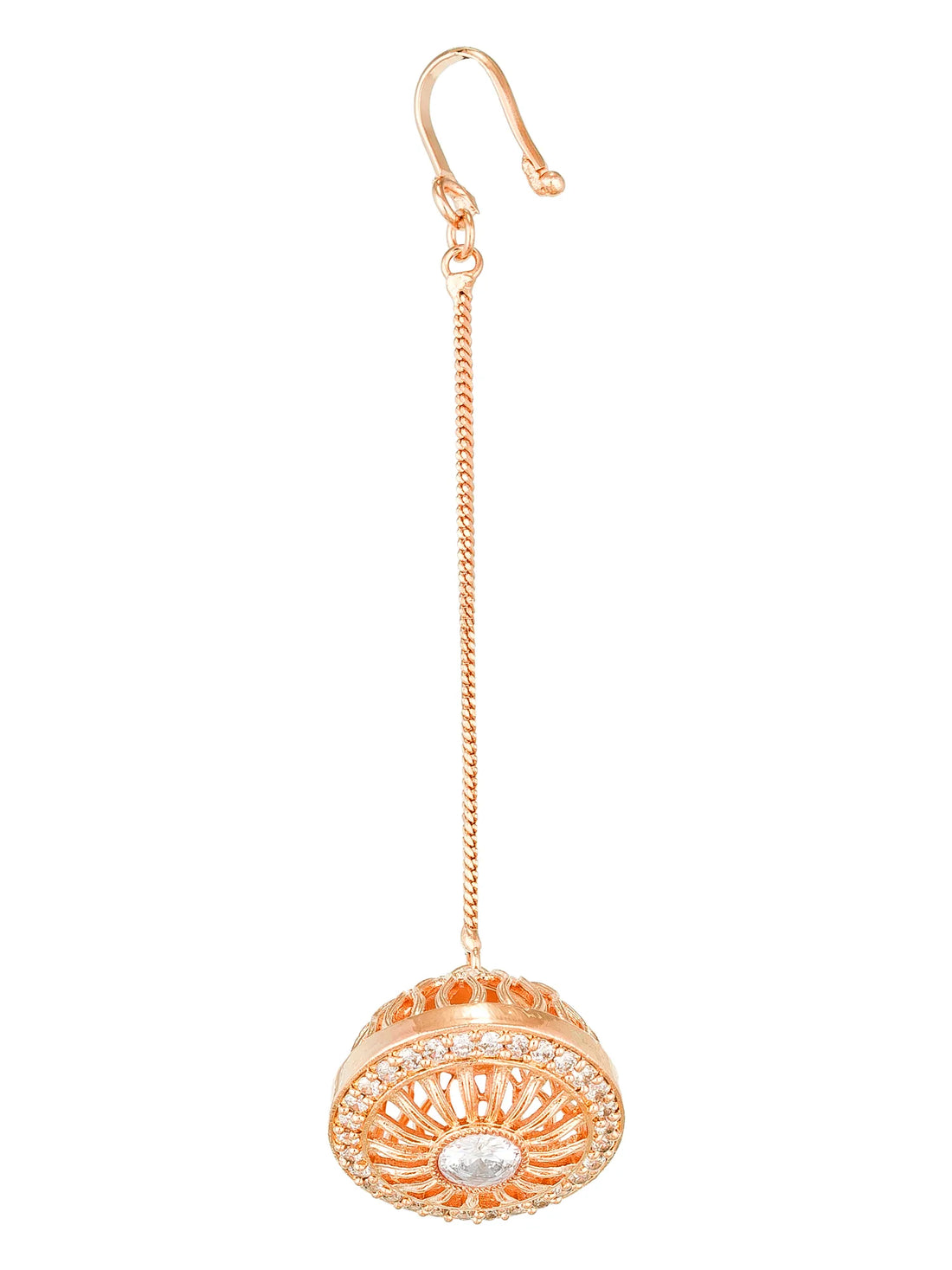 Rose gold earring with intricate design on a light green background
