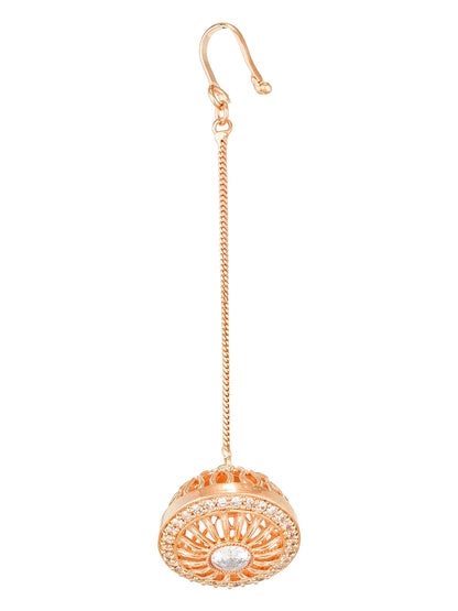 Rose gold earring with intricate design on a white background