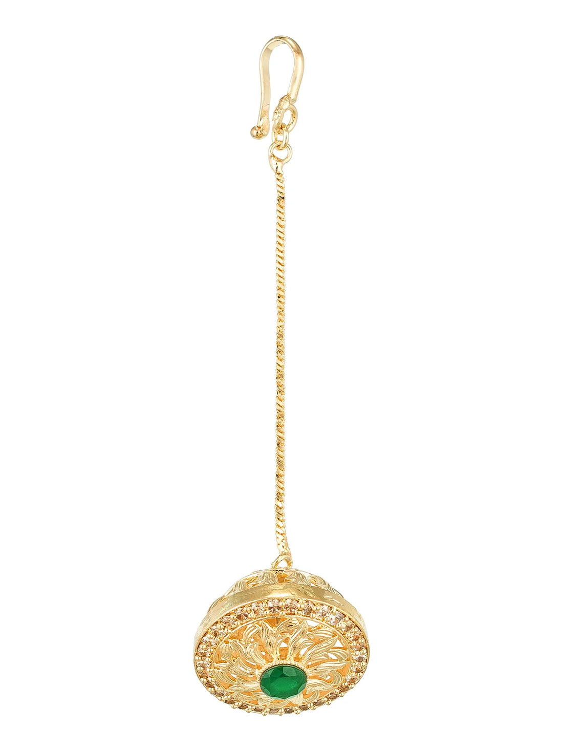 Gold earring with green gemstone on a light green background
