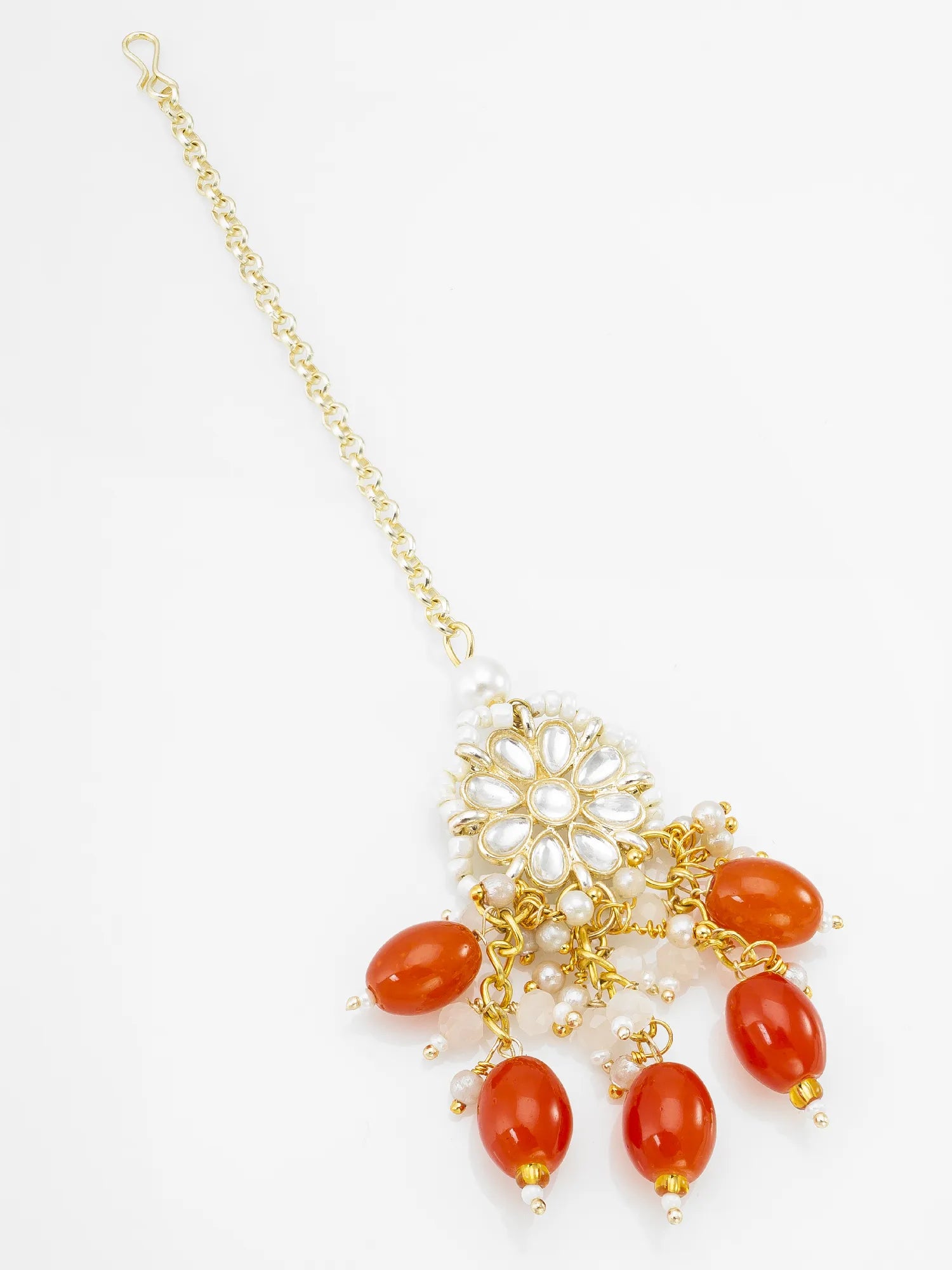 Necklace with gold chain and red beads on a white background