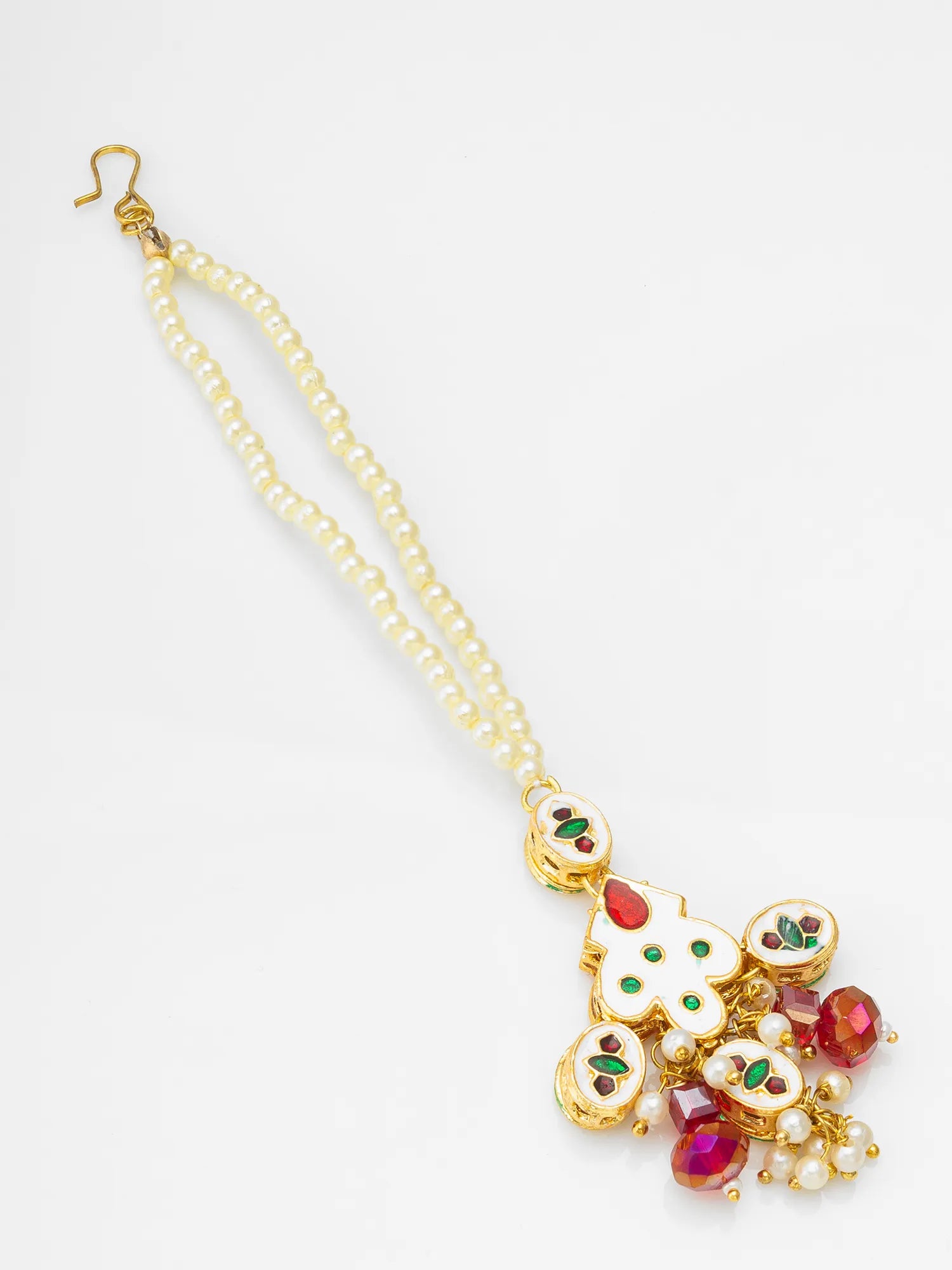 Gold necklace with a decorative pendant on a white background