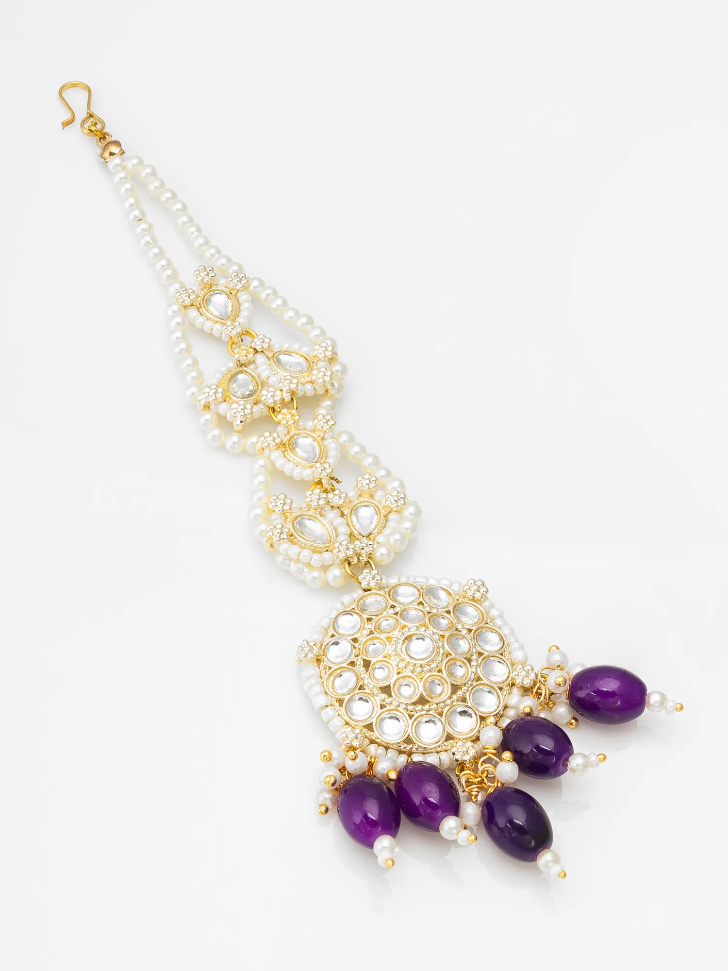 Necklace with gold, white, and purple beads on a white background