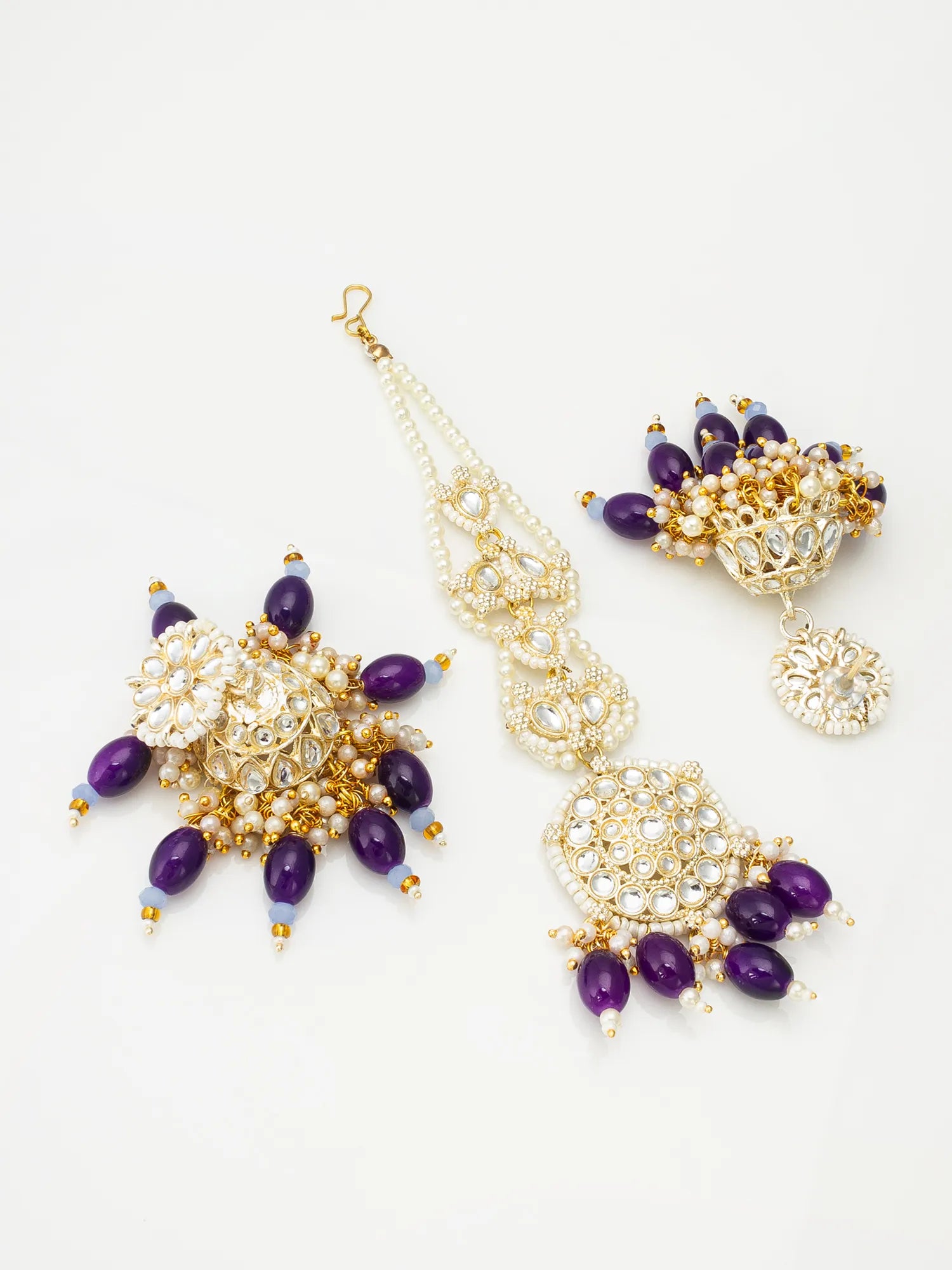 Jewelry set with necklace and earrings on a white background