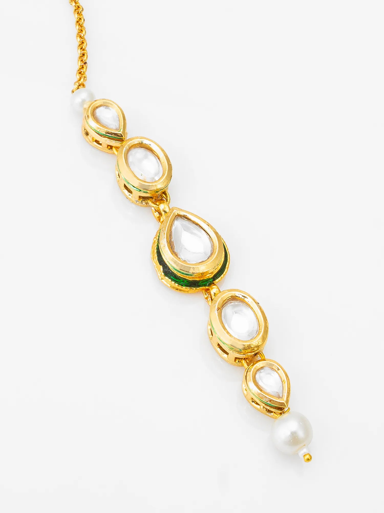 Gold necklace with green and white stones on a white background
