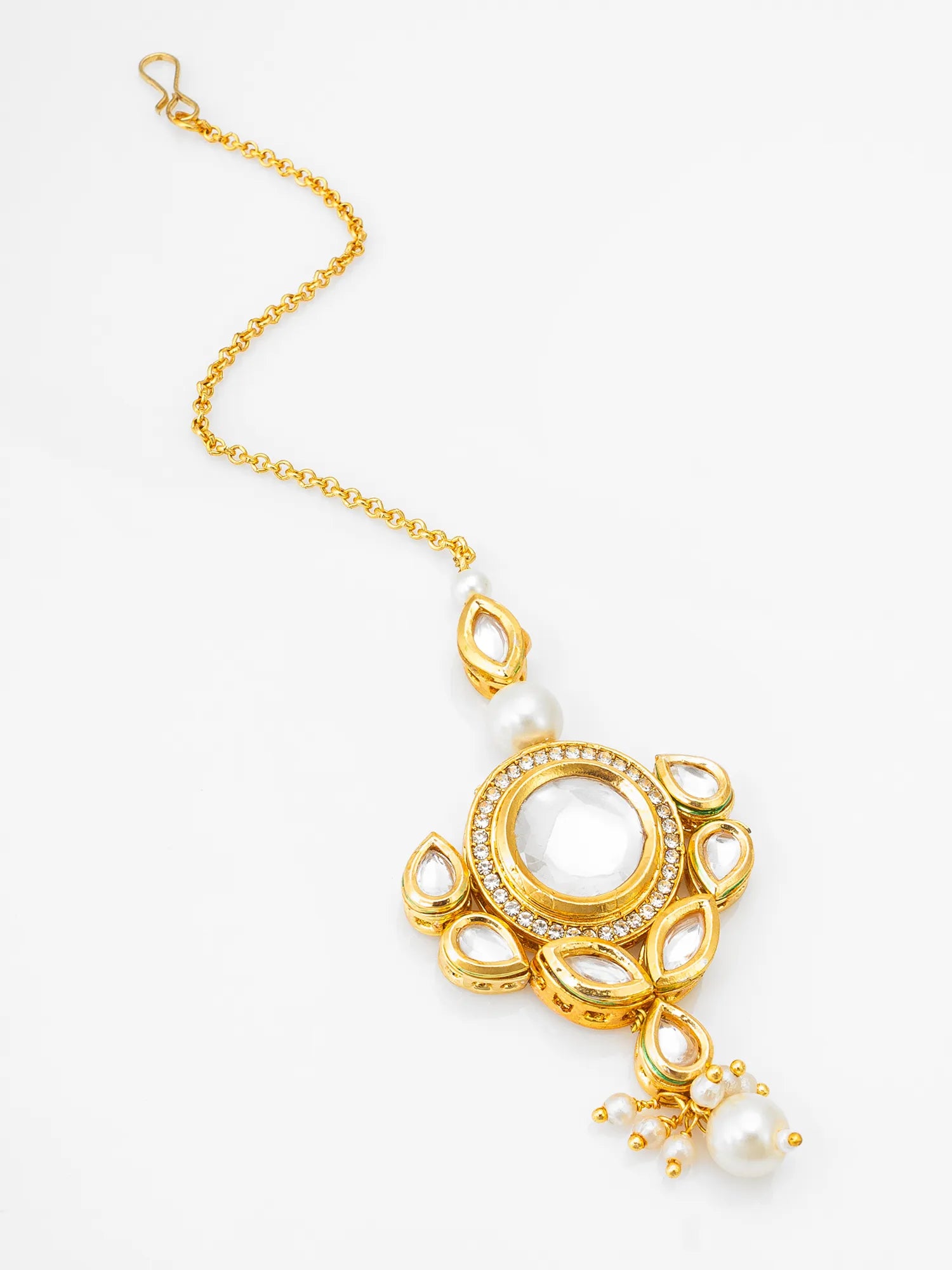 Gold necklace with a white pendant on a white background