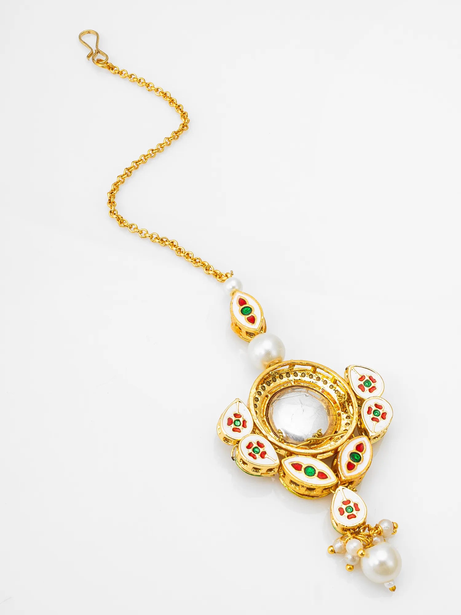 Gold necklace with pearls and gemstones on a white background