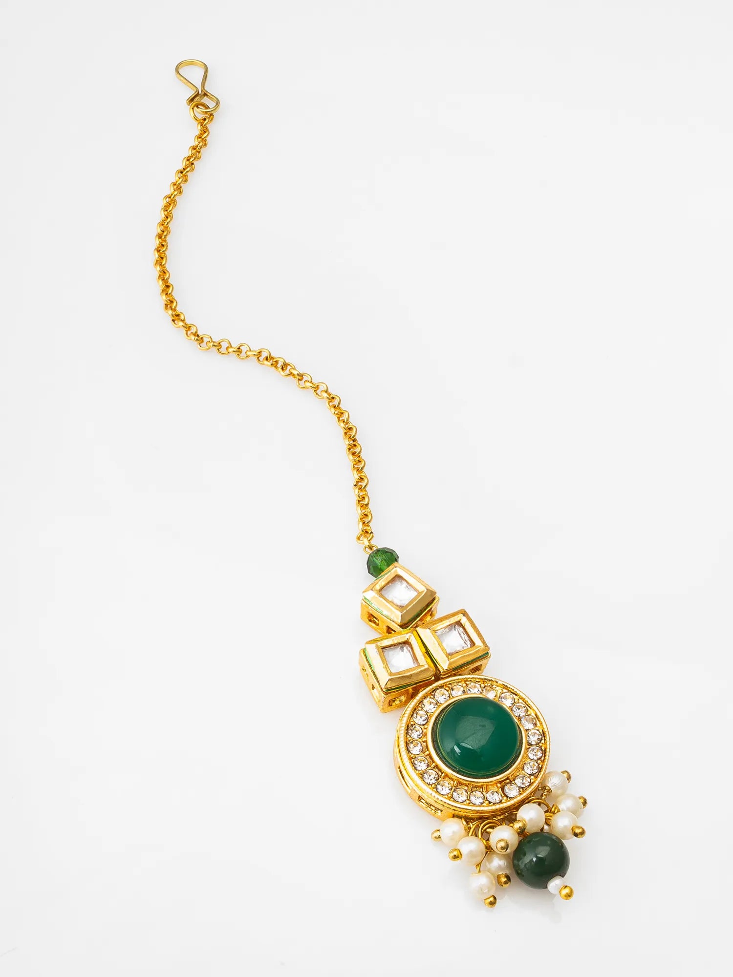 Gold necklace with green gemstones on a white background