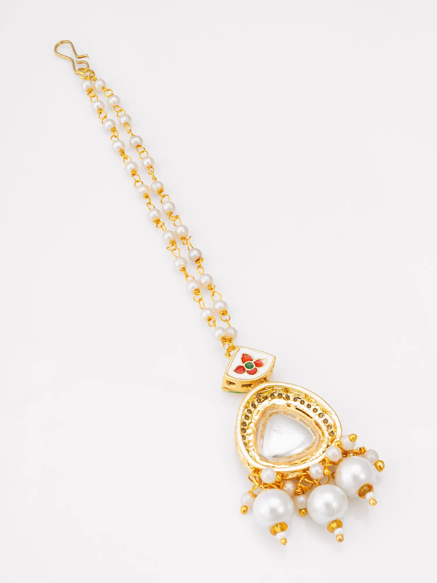 Gold necklace with heart-shaped pendant and pearl beads on a white background