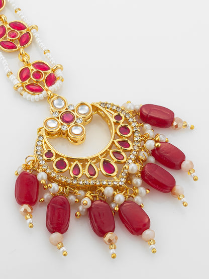 Aadita Gold Plated Kundan Chandbali Maang Tikka with Ruby Red Beads and Pearl Chain