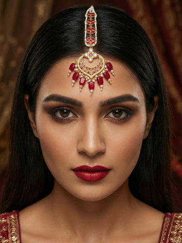Aadita Gold Plated Kundan Chandbali Maang Tikka with Ruby Red Beads and Pearl Chain
