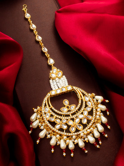 Aadita Gold Plated Kundan Chandbali Maang Tikka with Pearl and Red Crystal Drops