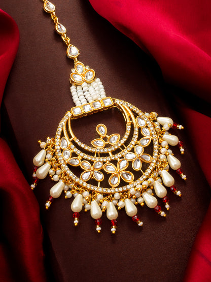 Aadita Gold Plated Kundan Chandbali Maang Tikka with Pearl and Red Crystal Drops