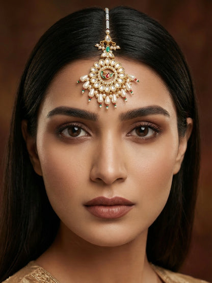 Aadita Gold Plated Kundan Peacock Maang Tikka with Pearl and Red-Green Bead Chain