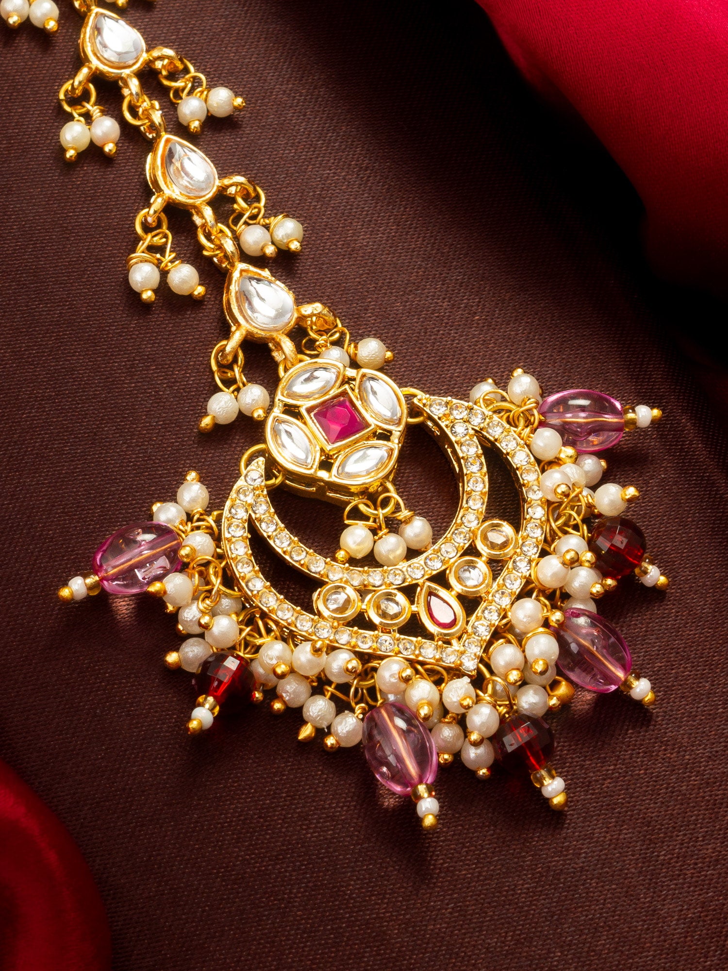 Aadita Gold Plated Kundan Chandbali Maang Tikka with Pink and Maroon Bead Drops