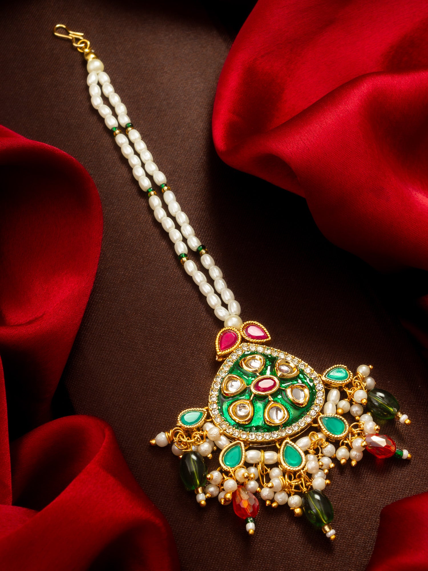 Aadita Gold Plated Kundan Mangtika with Green Meenakari Pendant and Pearl Bead Chain